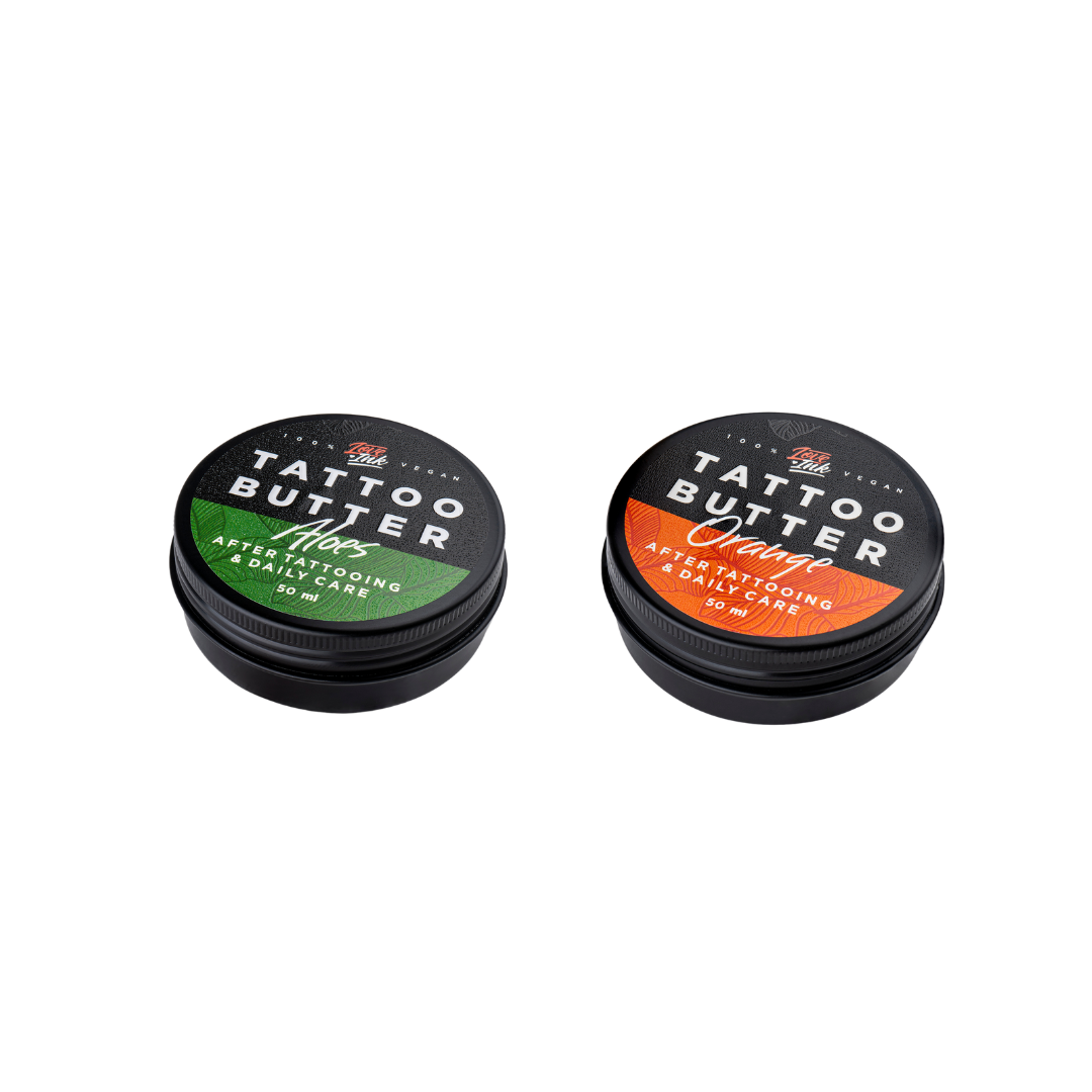 dvě balení Tattoo Butter Aloe Vera se zelenou etiketou a Tattoo Butter Orange s oranžovou etiketou 50 ml